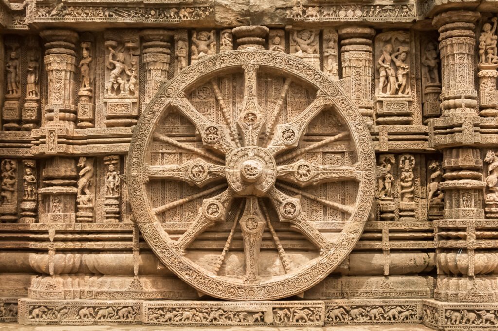 A chariot wheel carved into the wall of the sun temple at Konark, India